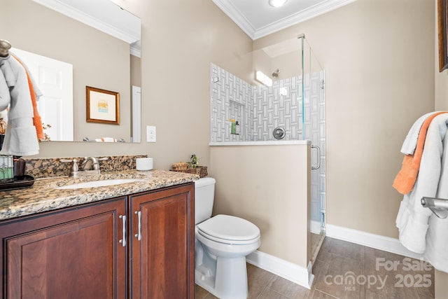 full bath with vanity, ornamental molding, toilet, baseboards, and a shower stall