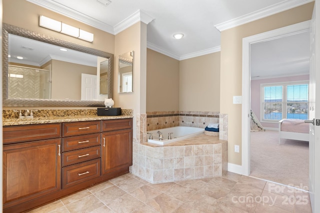 bathroom featuring a bath, crown molding, tile patterned flooring, a shower stall, and vanity