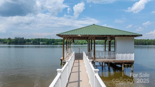 dock area featuring a water view