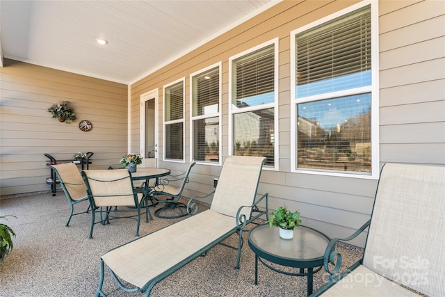 view of patio featuring a porch