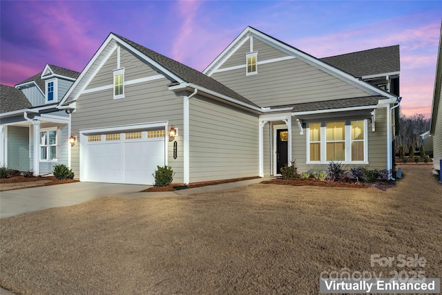 view of property featuring a garage