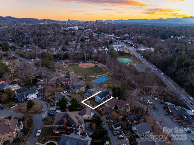 aerial view at dusk with a mountain view