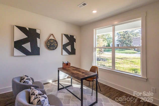 office space with hardwood / wood-style flooring