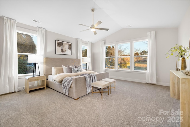 bedroom with vaulted ceiling, carpet floors, visible vents, and baseboards