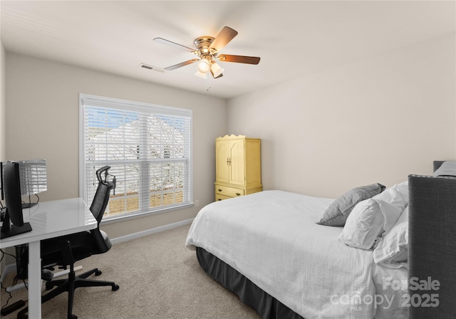 bedroom featuring light carpet and ceiling fan