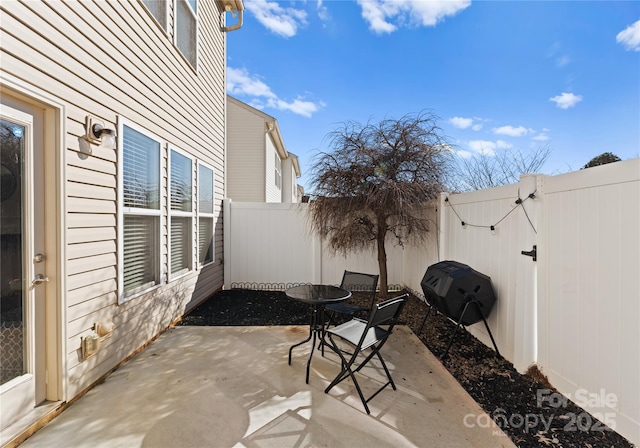 view of patio / terrace with a grill