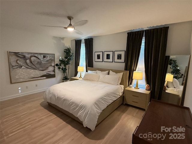 bedroom featuring ceiling fan and light hardwood / wood-style floors