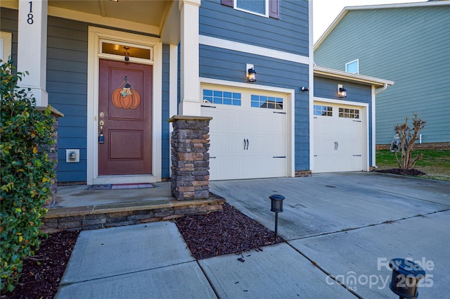 property entrance with a garage