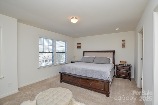 bedroom featuring light colored carpet