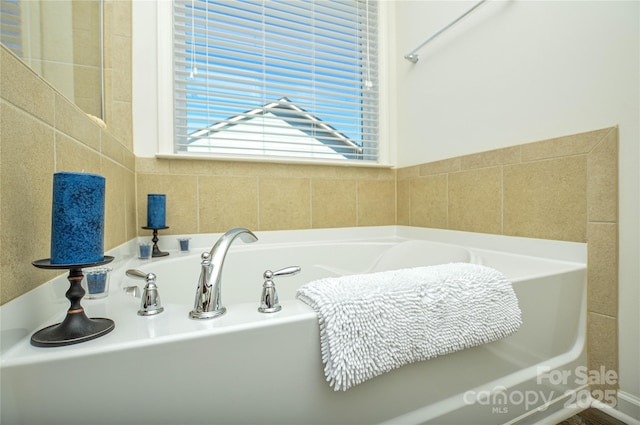 bathroom featuring a tub