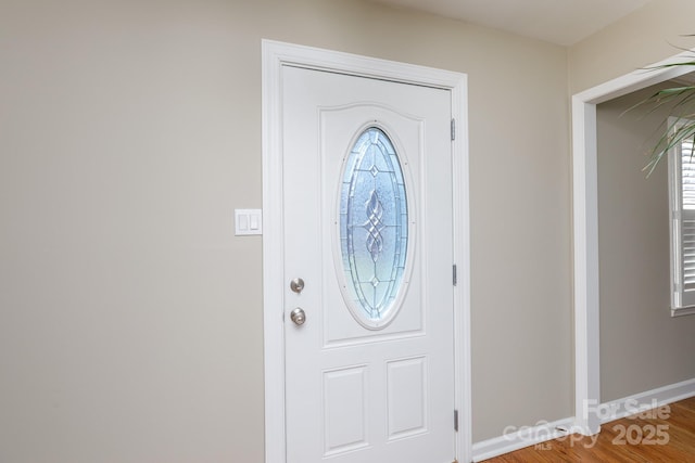 foyer entrance featuring hardwood / wood-style flooring