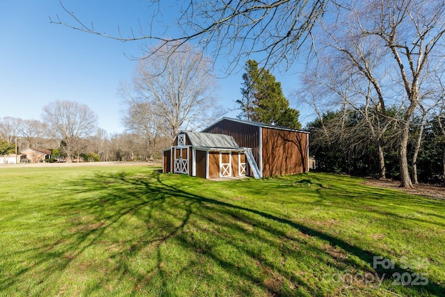 view of outbuilding with a lawn