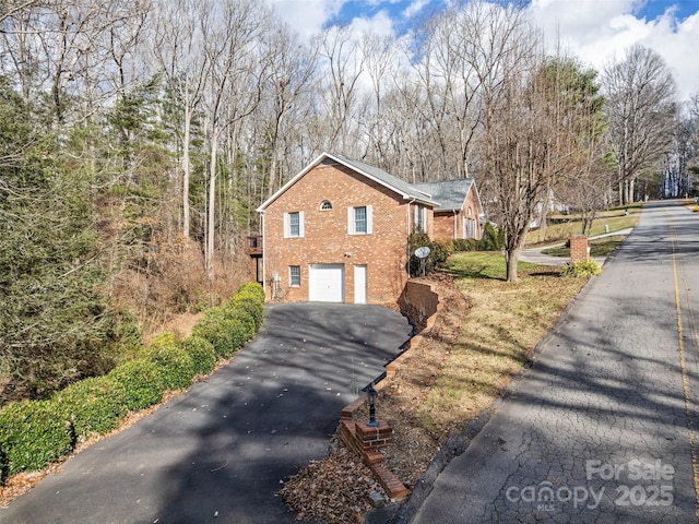 view of home's exterior featuring a garage