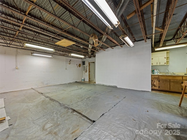 interior space with a workshop area and sink