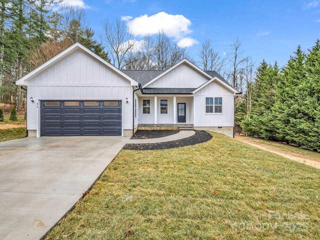 modern farmhouse style home with a front yard and a garage