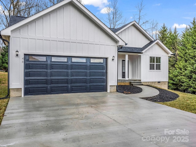 modern farmhouse style home with a garage