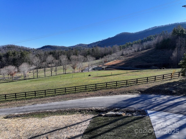 view of mountain feature with a rural view