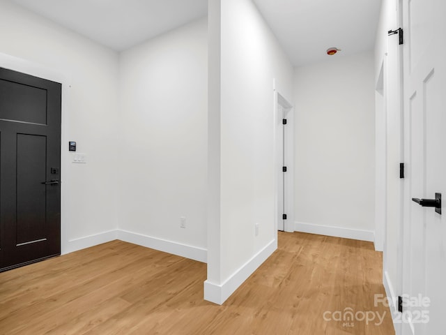 hall featuring light hardwood / wood-style flooring