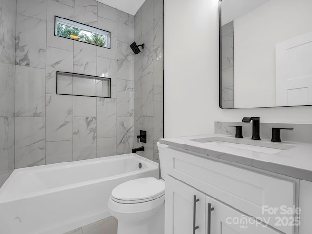 full bathroom with tiled shower / bath combo, toilet, and vanity