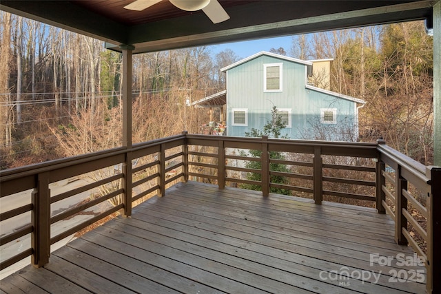 wooden deck with ceiling fan