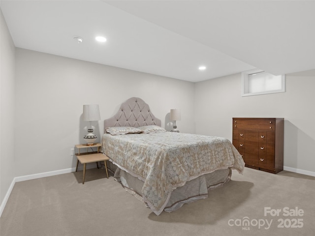 bedroom featuring light colored carpet