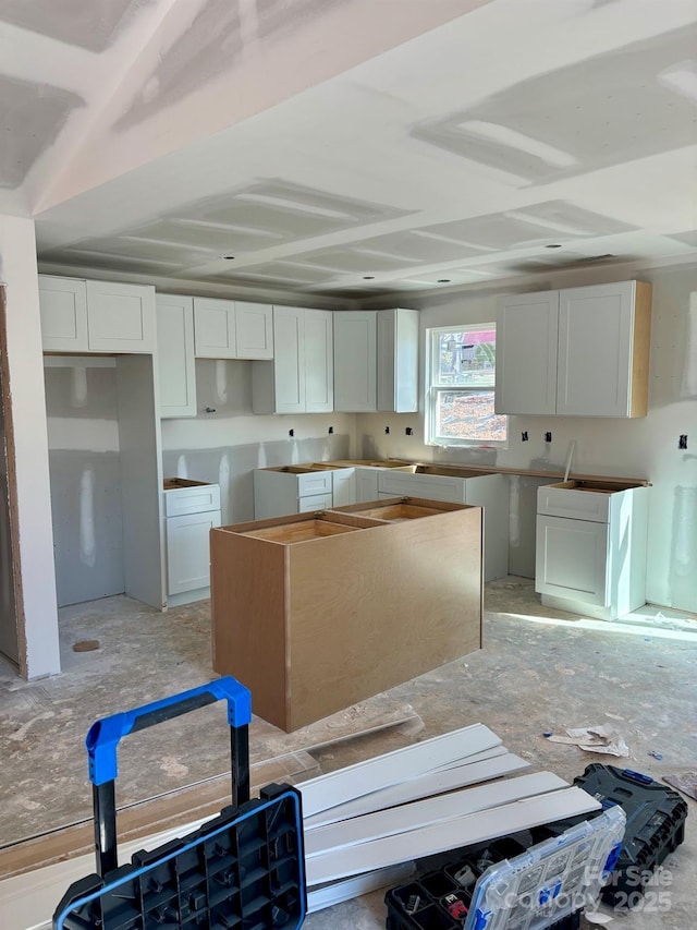 kitchen featuring white cabinets