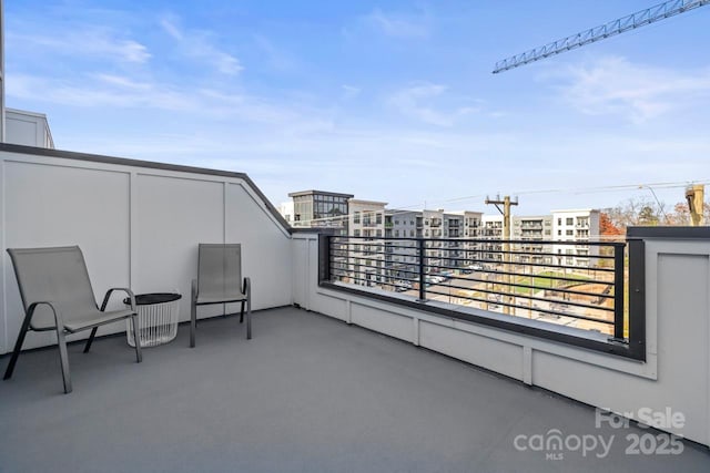 view of patio / terrace featuring a balcony