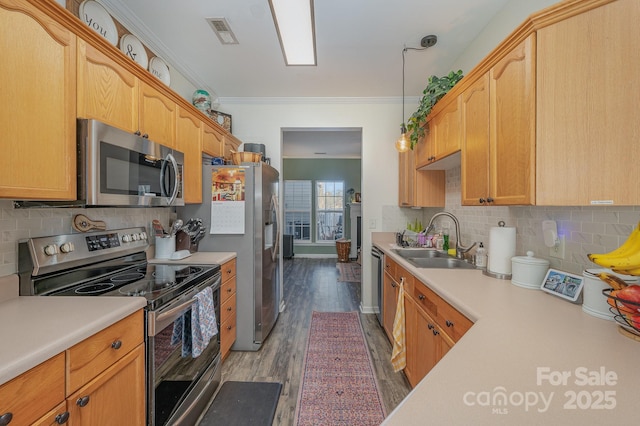 kitchen featuring sink, tasteful backsplash, dark hardwood / wood-style floors, crown molding, and appliances with stainless steel finishes