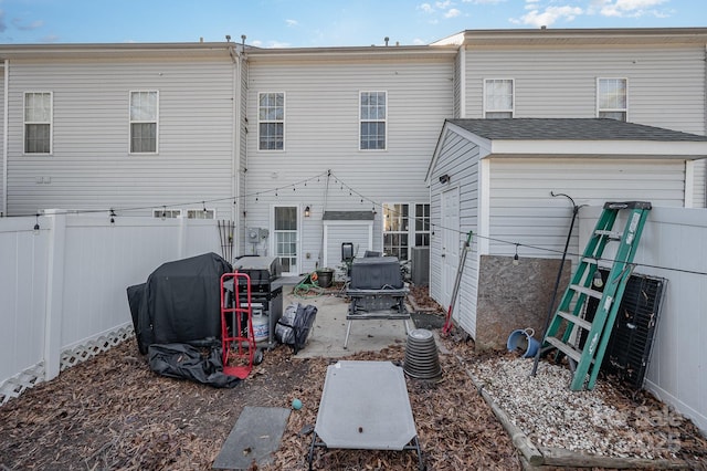 back of house with a patio area