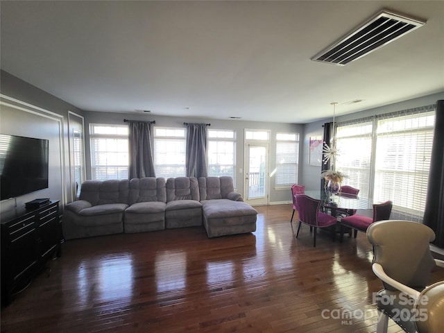 living room with dark hardwood / wood-style floors