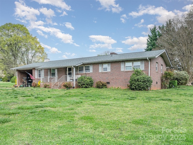 ranch-style house featuring a porch and a front yard