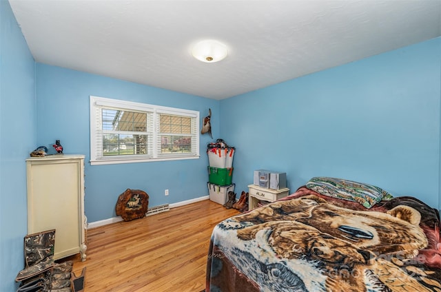 bedroom featuring light hardwood / wood-style floors