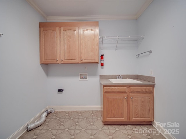 laundry room featuring cabinets, hookup for a washing machine, ornamental molding, and sink