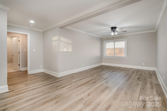 spare room with ceiling fan, light wood-type flooring, and ornamental molding