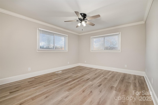 spare room with ceiling fan, light hardwood / wood-style floors, and ornamental molding