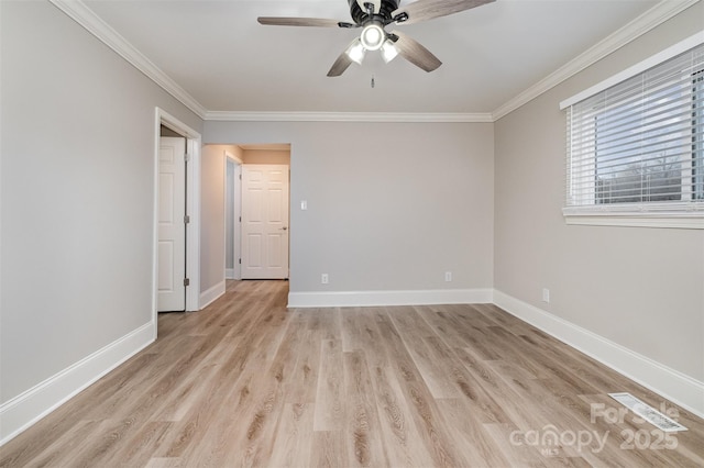 unfurnished room featuring light wood-type flooring, ceiling fan, and ornamental molding