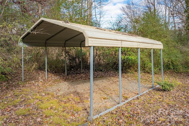 view of parking / parking lot with a carport