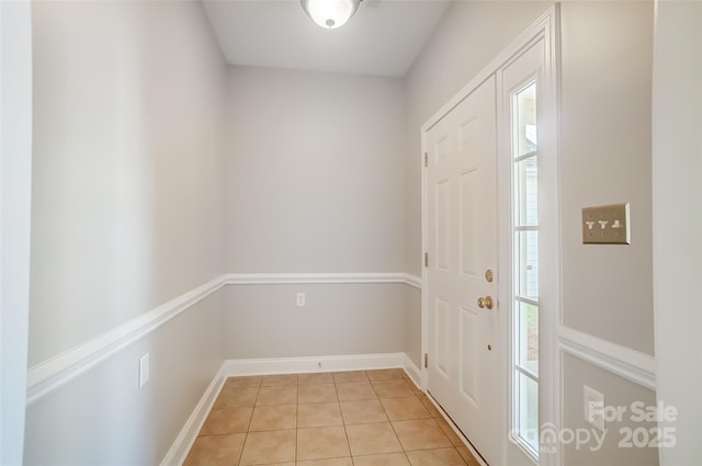 view of tiled foyer entrance