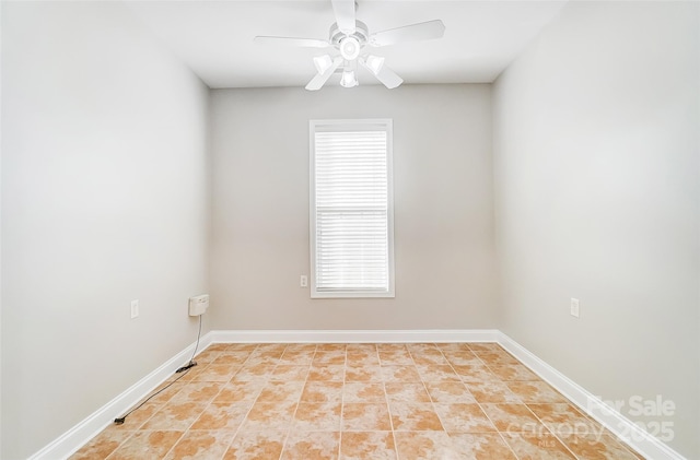 spare room featuring ceiling fan