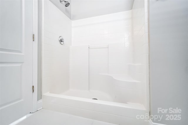 bathroom with a shower