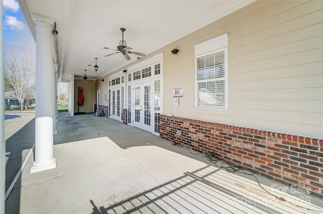 view of patio featuring ceiling fan and french doors