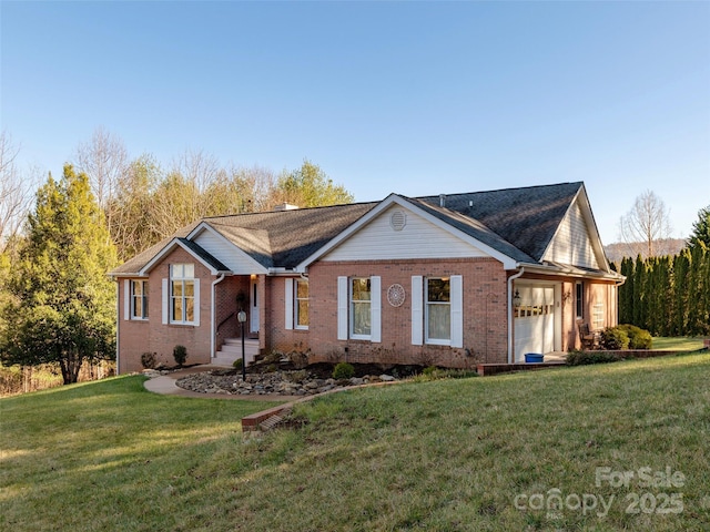 single story home featuring a garage and a front lawn