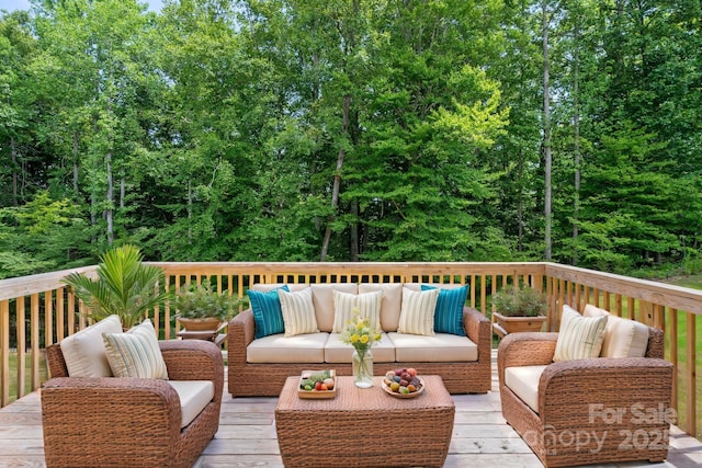 deck with an outdoor living space