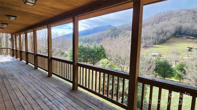 wooden terrace with a mountain view