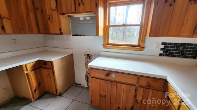 kitchen with light tile patterned floors