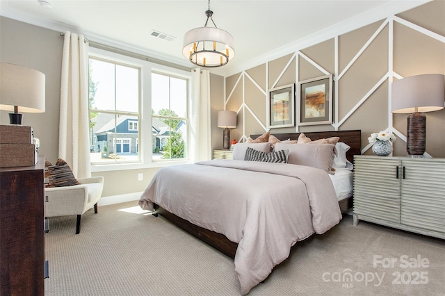 bedroom featuring carpet and crown molding