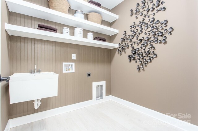 laundry area with sink