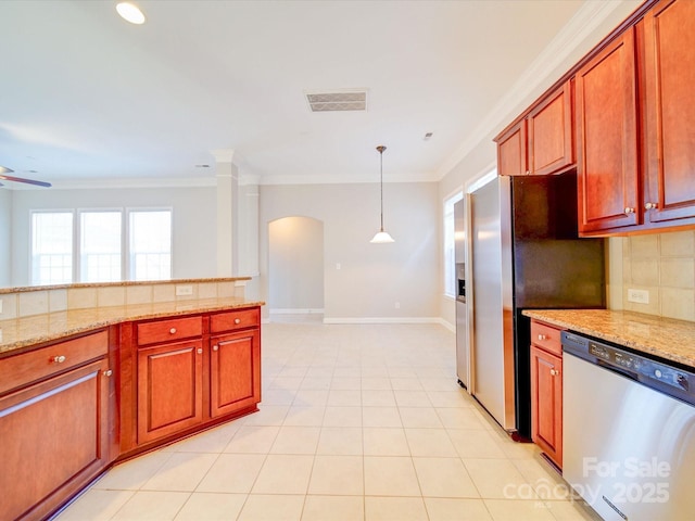 kitchen featuring decorative light fixtures, ornamental molding, light stone countertops, and stainless steel appliances