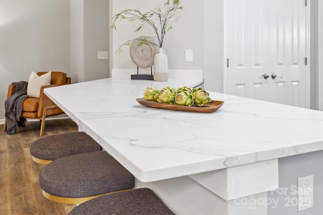 dining area with hardwood / wood-style flooring