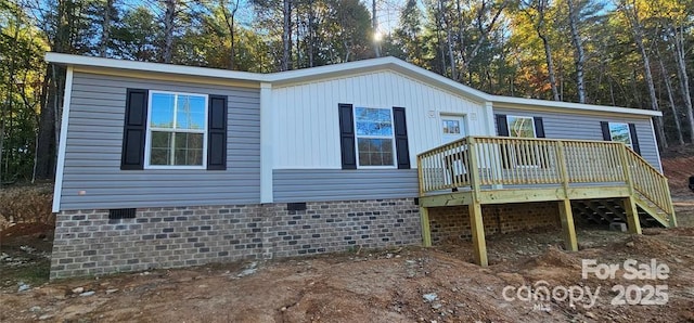 exterior space featuring a wooden deck